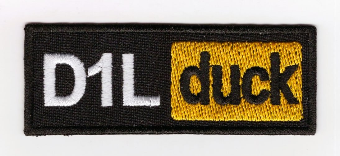 D1L DUCK \ тк. чорна \ нагрудний напис !